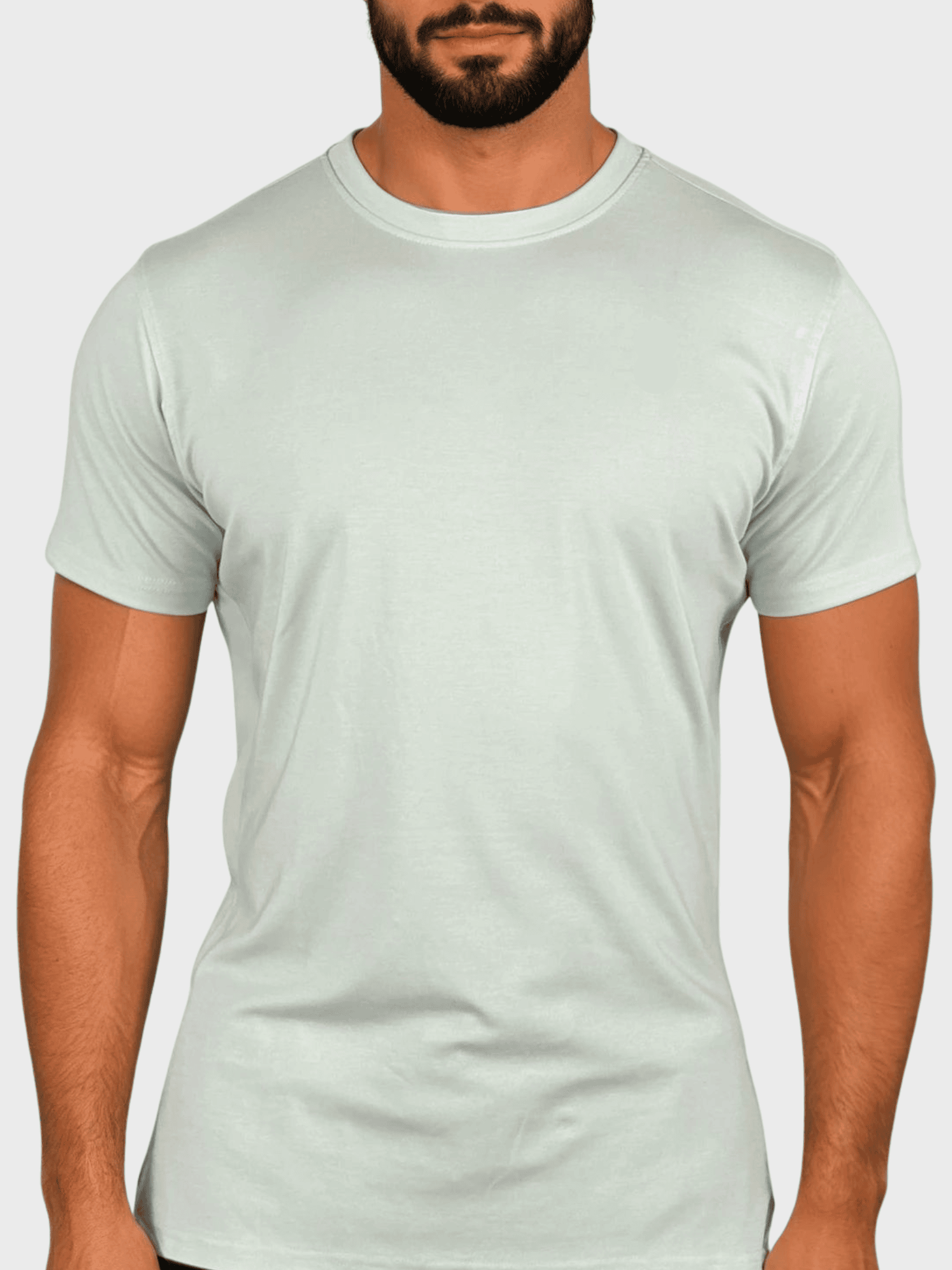 Man wearing a light gray t-shirt on a white background